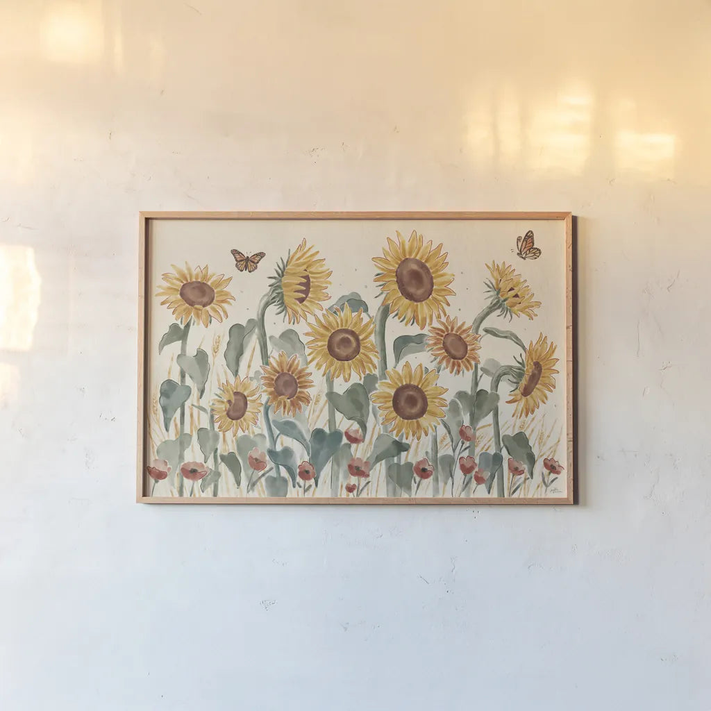 Sunflower Season I by Janelle Penner. shown as a paper print in a natural frame. Available as a archival giclee rolled canvas, fine art paper, or poster print. SKU 76481i.