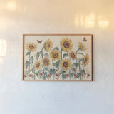 Sunflower Season I by Janelle Penner. shown as a paper print in a natural frame. Available as a archival giclee rolled canvas, fine art paper, or poster print. SKU 76481i.