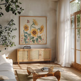 Sunflower Season II Bright by Janelle Penner. Shown in a natural wood frame in a cozy modern living room. Available as an archival giclee rolled canvas, fine art paper, or poster print. SKU 77836a.