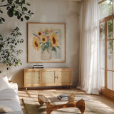 Sunflower Season V Bright by Janelle Penner. Shown in a natural wood frame in a cozy modern living room. Available as an archival giclee rolled canvas, fine art paper, or poster print. SKU 77839a.