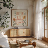 Sunflower Season VI by Janelle Penner. Shown in a natural wood frame in a cozy modern living room. Available as an archival giclee rolled canvas, fine art paper, or poster print. SKU 76486a.