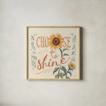 Sunflower Season VII by Janelle Penner. Shown in a natural wood glass frame for a timeless modern aesthetic. Available as an archival giclee rolled canvas, fine art paper, or poster print. SKU 76487a.