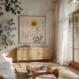 Sunflower Season VII Bright by Janelle Penner. Shown in a natural wood frame in a cozy modern living room. Available as an archival giclee rolled canvas, fine art paper, or poster print. SKU 77841a.