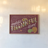 Thankful I Red by Janelle Penner. shown as a paper print in a natural frame. Available as a archival giclee rolled canvas, fine art paper, or poster print. SKU 45431i.
