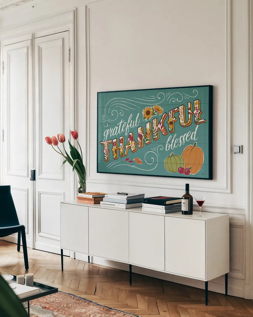 Thankful I Turquoise by Janelle Penner. shown as a framed stretched canvas in a living room above a console. Available as a archival giclee rolled canvas, fine art paper, or poster print. SKU 43103i.