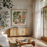 Urban Jungle II by Janelle Penner. Shown in a natural wood frame in a cozy modern living room. Available as an archival giclee rolled canvas, fine art paper, or poster print. SKU 73731a.