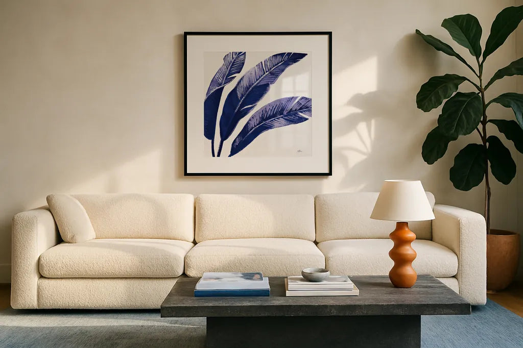 Welcome to Paradise XI Indigo by Janelle Penner. Displayed in a glass frame with matte in a clean modern living room. Available as an archival giclee rolled canvas, fine art paper, or poster print. SKU 34077a.