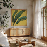 Welcome to Paradise XI Yellow by Janelle Penner. Shown in a natural wood frame in a cozy modern living room. Available as an archival giclee rolled canvas, fine art paper, or poster print. SKU 55553a.