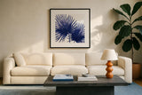 Welcome to Paradise XII Indigo by Janelle Penner. Displayed in a glass frame with matte in a clean modern living room. Available as an archival giclee rolled canvas, fine art paper, or poster print. SKU 34078a.