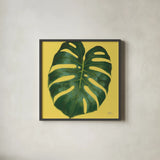 Welcome to Paradise XIII Yellow by Janelle Penner. Shown in a sleek black glass frame for a contemporary gallery look. Available as an archival giclee rolled canvas, fine art paper, or poster print. SKU 55554a.
