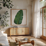 Welcome to Paradise XV on White by Janelle Penner. Shown in a natural wood frame in a cozy modern living room. Available as an archival giclee rolled canvas, fine art paper, or poster print. SKU 31553a.