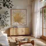 Welcome to Paradise XVI Gold by Janelle Penner. Shown in a natural wood frame in a cozy modern living room. Available as an archival giclee rolled canvas, fine art paper, or poster print. SKU 55648a.