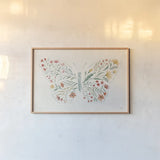 Wildflower Vibes Butterfly by Janelle Penner. shown as a paper print in a natural frame. Available as a archival giclee rolled canvas, fine art paper, or poster print. SKU 75533i.