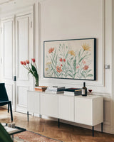 Wildflower Vibes I by Janelle Penner. shown as a framed stretched canvas in a living room above a console. Available as a archival giclee rolled canvas, fine art paper, or poster print. SKU 74609i.
