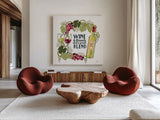 Wine and Friends V on White by Janelle Penner. Shown as extra-large giant wall art in a modern living room. Available as an archival giclee rolled canvas, fine art paper, or poster print. SKU 34539a.
