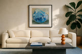 Beach Comber Dark Blue by Jeanette Vertentes. Displayed in a glass frame with matte in a clean modern living room. Available as an archival giclee rolled canvas, fine art paper, or poster print. SKU 79088a.