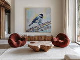 Chickadee by Jeanette Vertentes. Shown as extra-large giant wall art in a modern living room. Available as an archival giclee rolled canvas, fine art paper, or poster print. SKU 63458a.