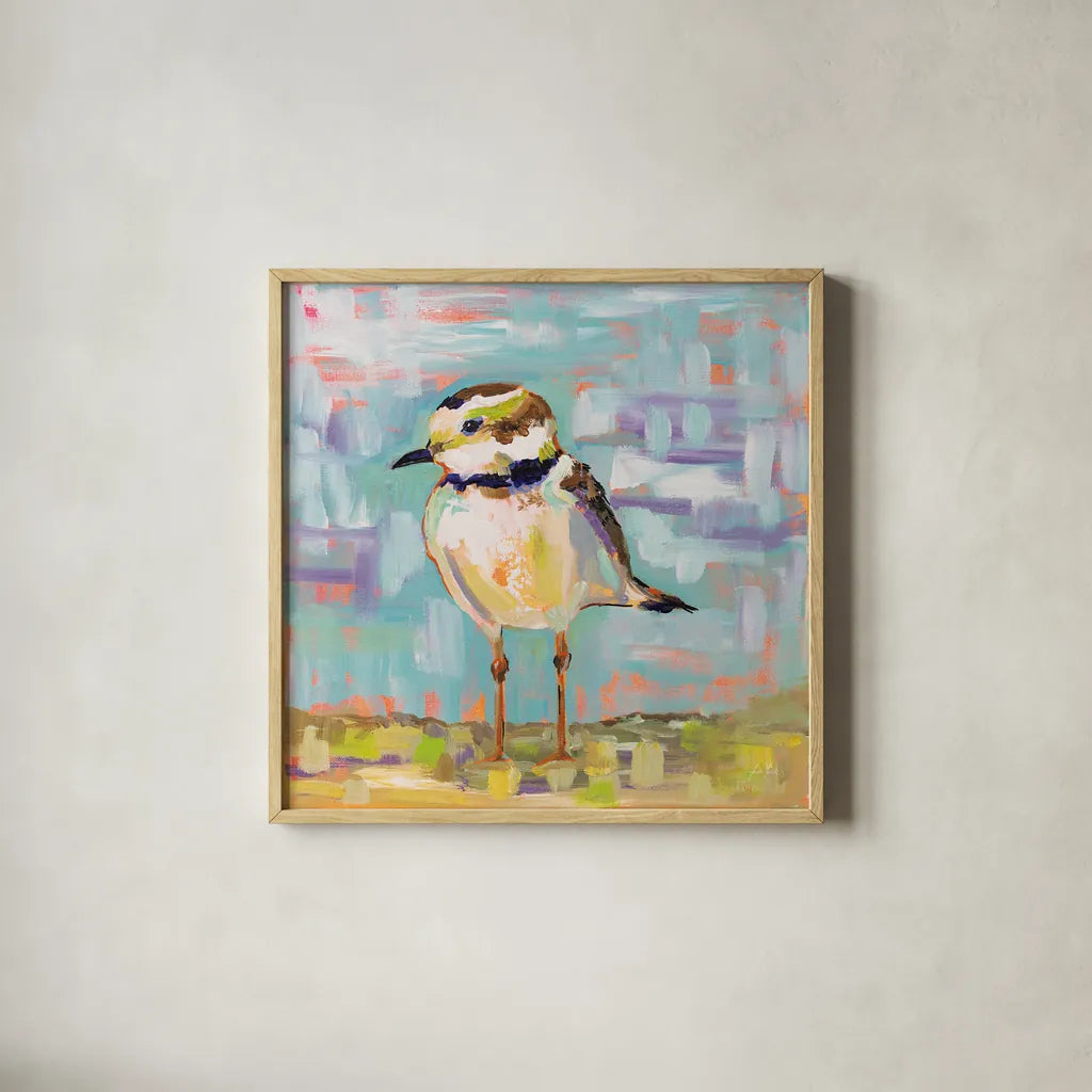 Coastal Plover II by Jeanette Vertentes. Shown in a natural wood glass frame for a timeless modern aesthetic. Available as an archival giclee rolled canvas, fine art paper, or poster print. SKU 55180a.