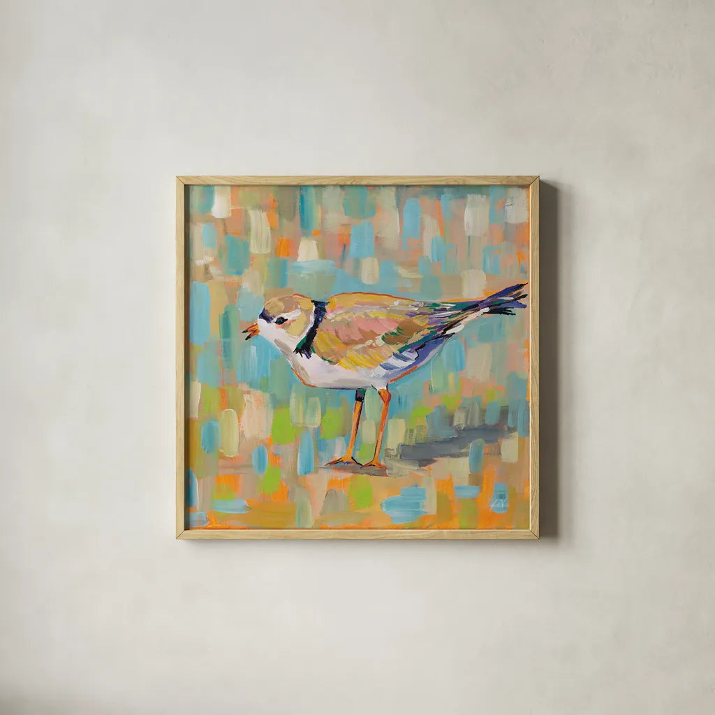 Coastal Plover IV by Jeanette Vertentes. Shown in a natural wood glass frame for a timeless modern aesthetic. Available as an archival giclee rolled canvas, fine art paper, or poster print. SKU 55182a.