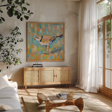 Coastal Plover IV by Jeanette Vertentes. Shown in a natural wood frame in a cozy modern living room. Available as an archival giclee rolled canvas, fine art paper, or poster print. SKU 55182a.