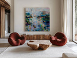 Evolving by Jeanette Vertentes. Shown as extra-large giant wall art in a modern living room. Available as an archival giclee rolled canvas, fine art paper, or poster print. SKU 86791a.