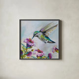 Hummingbird II Florals by Jeanette Vertentes. Shown in a sleek black glass frame for a contemporary gallery look. Available as an archival giclee rolled canvas, fine art paper, or poster print. SKU 63689a.
