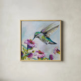 Hummingbird II Florals by Jeanette Vertentes. Shown in a natural wood glass frame for a timeless modern aesthetic. Available as an archival giclee rolled canvas, fine art paper, or poster print. SKU 63689a.