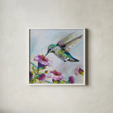 Hummingbird II Florals by Jeanette Vertentes. Shown in a crisp white glass frame for a clean and minimalist style. Available as an archival giclee rolled canvas, fine art paper, or poster print. SKU 63689a.