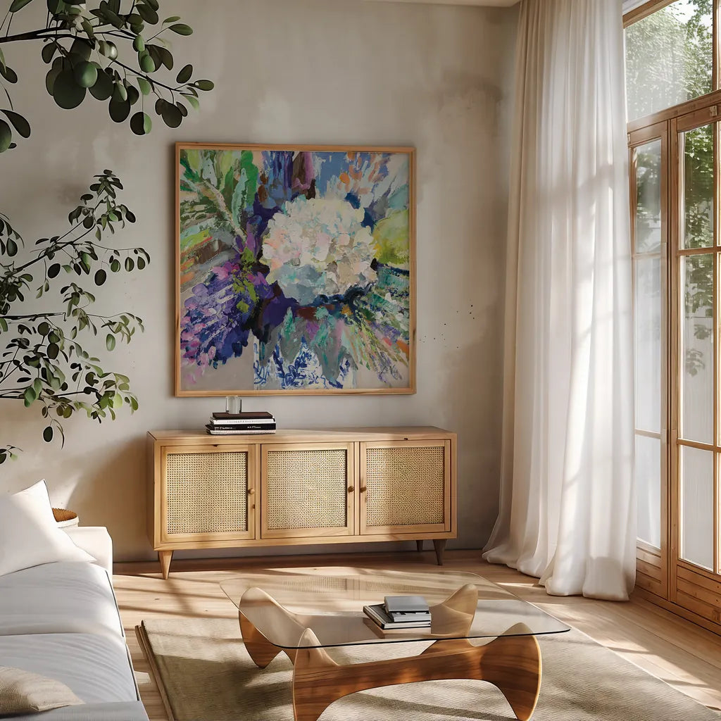 Hydrangea Chinoiserie I by Jeanette Vertentes. Shown in a natural wood frame in a cozy modern living room. Available as an archival giclee rolled canvas, fine art paper, or poster print. SKU 84311a.