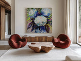 Hydrangea Chinoiserie II by Jeanette Vertentes. Shown as extra-large giant wall art in a modern living room. Available as an archival giclee rolled canvas, fine art paper, or poster print. SKU 84312a.