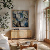 Key West Shells by Jeanette Vertentes. Shown in a natural wood frame in a cozy modern living room. Available as an archival giclee rolled canvas, fine art paper, or poster print. SKU 55495a.