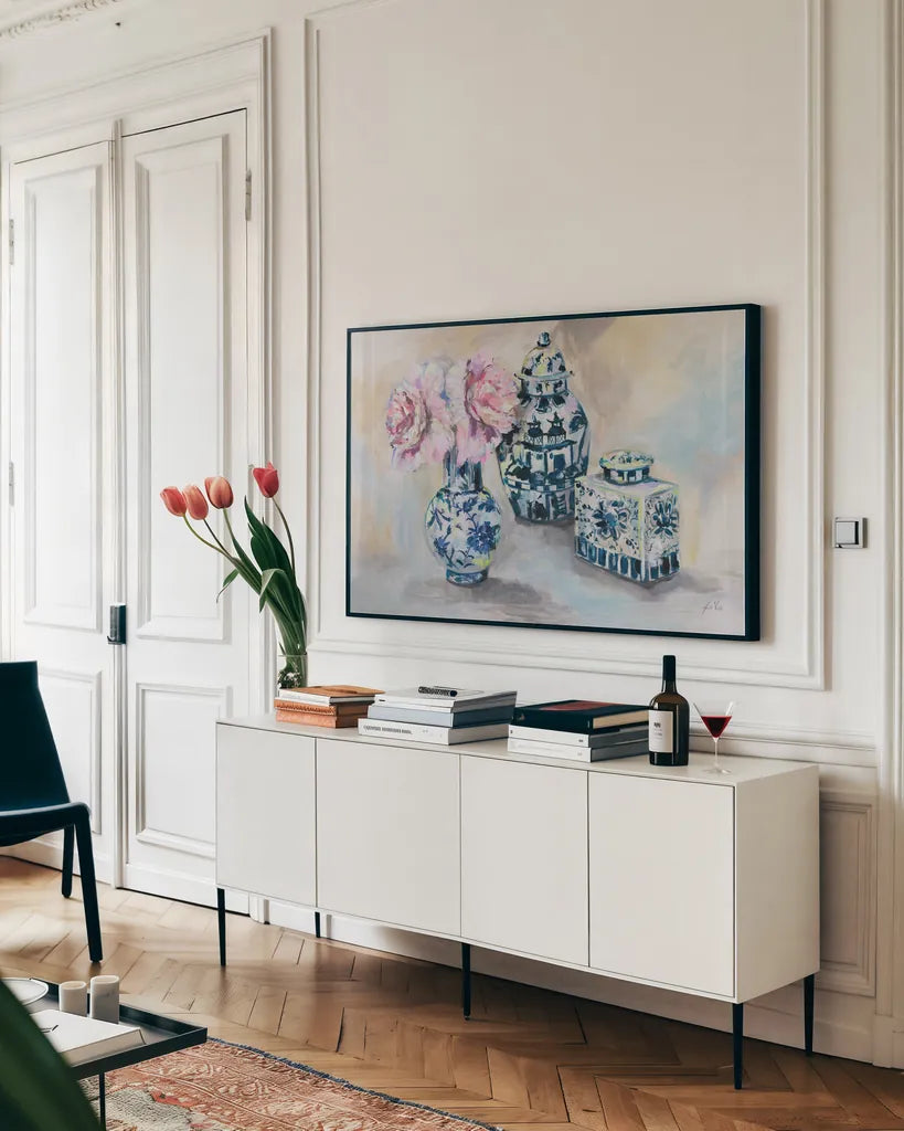 Peony Play by Jeanette Vertentes. shown as a framed stretched canvas in a living room above a console. Available as a archival giclee rolled canvas, fine art paper, or poster print. SKU 93140i.