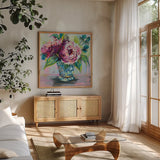 Pink Peonies I by Jeanette Vertentes. Shown in a natural wood frame in a cozy modern living room. Available as an archival giclee rolled canvas, fine art paper, or poster print. SKU 60524a.