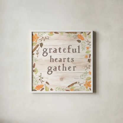 Autumn Offerings I Light Grateful by Jenaya Jackson. Shown in a crisp white glass frame for a clean and minimalist style. Available as an archival giclee rolled canvas, fine art paper, or poster print. SKU 44934a.