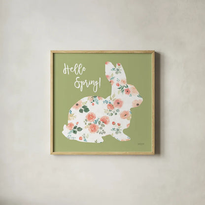 Blooming Delight Bunny II Spring by Jenaya Jackson. Shown in a natural wood glass frame for a timeless modern aesthetic. Available as an archival giclee rolled canvas, fine art paper, or poster print. SKU 89674a.