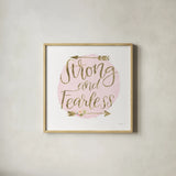 Girl Power I Strong and Fearless by Jenaya Jackson. Shown in a natural wood glass frame for a timeless modern aesthetic. Available as an archival giclee rolled canvas, fine art paper, or poster print. SKU 37493a.