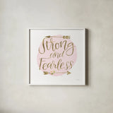 Girl Power I Strong and Fearless by Jenaya Jackson. Shown in a crisp white glass frame for a clean and minimalist style. Available as an archival giclee rolled canvas, fine art paper, or poster print. SKU 37493a.