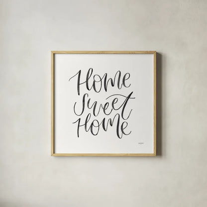 Home Sweet Home I BW by Jenaya Jackson. Shown in a natural wood glass frame for a timeless modern aesthetic. Available as an archival giclee rolled canvas, fine art paper, or poster print. SKU 64038a.