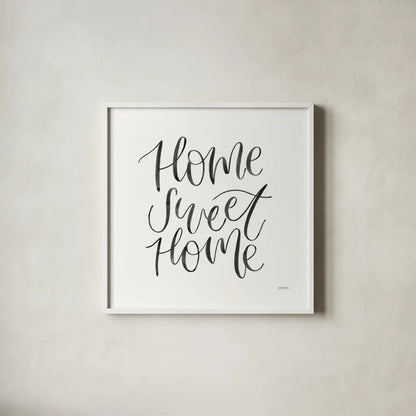 Home Sweet Home I BW by Jenaya Jackson. Shown in a crisp white glass frame for a clean and minimalist style. Available as an archival giclee rolled canvas, fine art paper, or poster print. SKU 64038a.