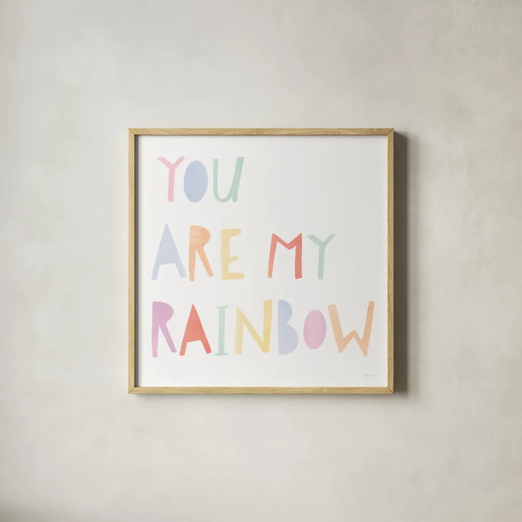 Lets Chase Rainbows X by Jenaya Jackson. Shown in a natural wood glass frame for a timeless modern aesthetic. Available as an archival giclee rolled canvas, fine art paper, or poster print. SKU 58976a.