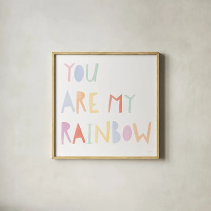 Lets Chase Rainbows X by Jenaya Jackson. Shown in a natural wood glass frame for a timeless modern aesthetic. Available as an archival giclee rolled canvas, fine art paper, or poster print. SKU 58976a.