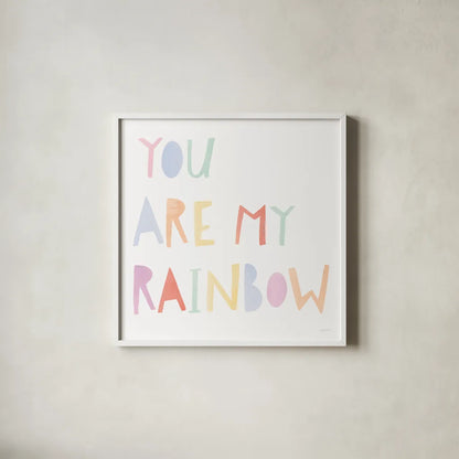 Lets Chase Rainbows X by Jenaya Jackson. Shown in a crisp white glass frame for a clean and minimalist style. Available as an archival giclee rolled canvas, fine art paper, or poster print. SKU 58976a.