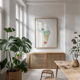 Lifes a Beach Scoops by Jenaya Jackson. shown as a print in a natural wood frame in a dining room. Available as a archival giclee rolled canvas, fine art paper, or poster print. SKU 100783h.
