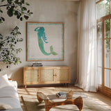 Mermaid Friends IV by Jenaya Jackson. Shown in a natural wood frame in a cozy modern living room. Available as an archival giclee rolled canvas, fine art paper, or poster print. SKU 41490a.