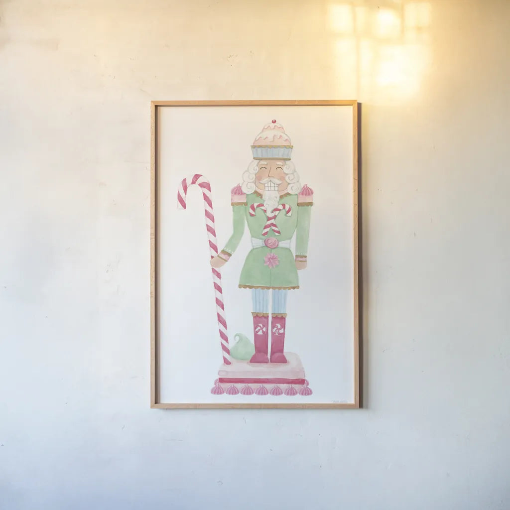 Nutcracker Bakery I by Jenaya Jackson. shown as a paper print in a natural frame. Available as a archival giclee rolled canvas, fine art paper, or poster print. SKU 99964h.