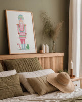 Nutcracker Bakery II by Jenaya Jackson. shown as a paper print in a natural frame. Available as a archival giclee rolled canvas, fine art paper, or poster print. SKU 99965h.