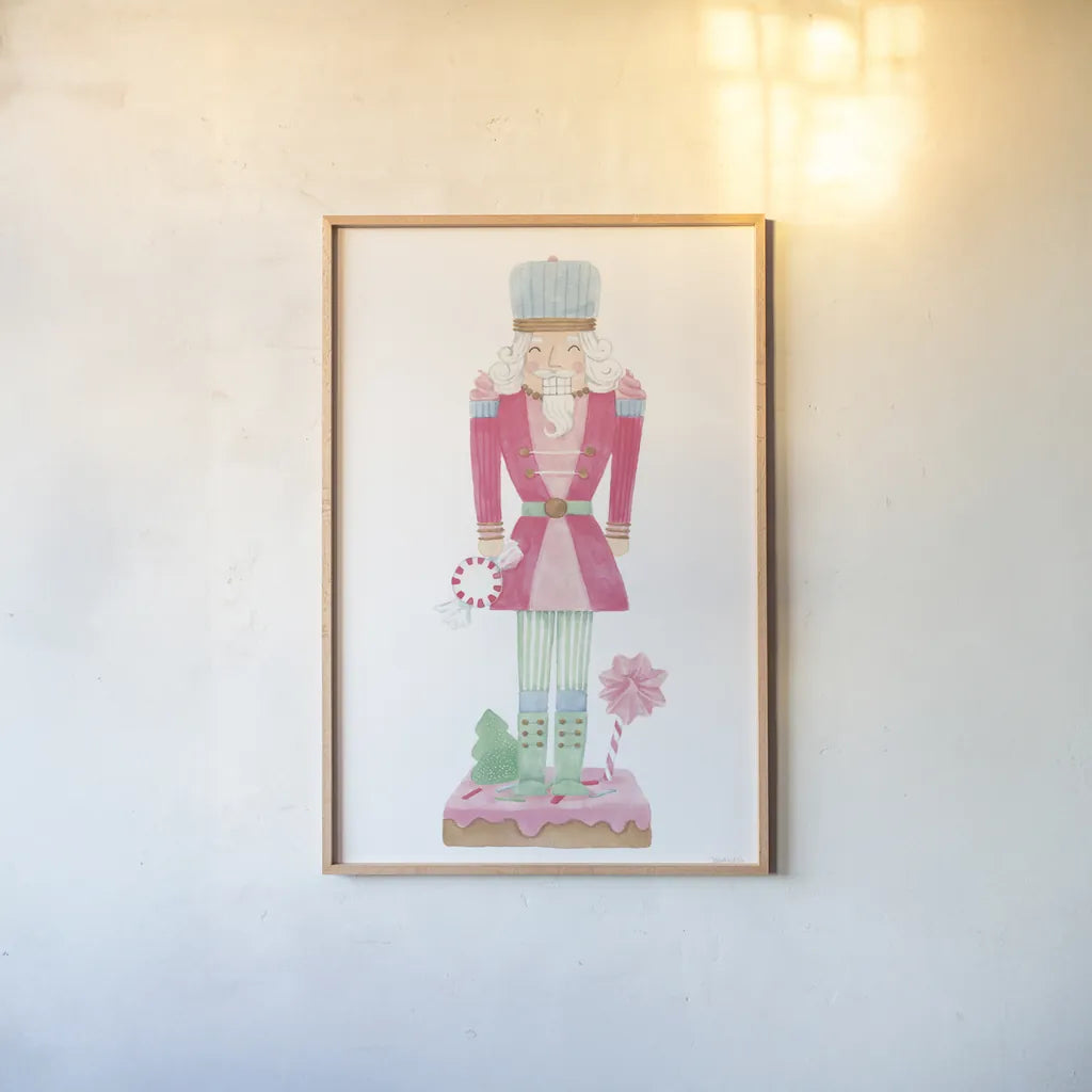 Nutcracker Bakery III by Jenaya Jackson. shown as a paper print in a natural frame. Available as a archival giclee rolled canvas, fine art paper, or poster print. SKU 99966h.