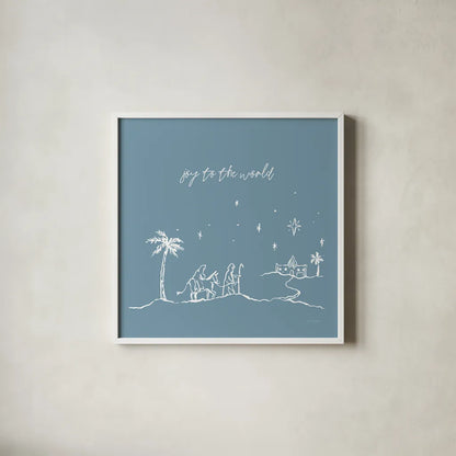 Simple Nativity I Blue by Jenaya Jackson. Shown in a crisp white glass frame for a clean and minimalist style. Available as an archival giclee rolled canvas, fine art paper, or poster print. SKU 102002a.
