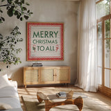 Welcome Christmas Sign V by Jenaya Jackson. Shown in a natural wood frame in a cozy modern living room. Available as an archival giclee rolled canvas, fine art paper, or poster print. SKU 36575a.