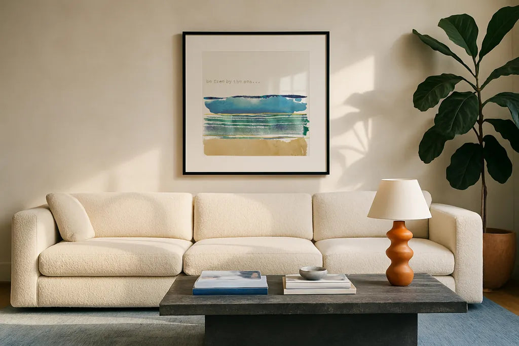 By the Sea I by Jess Aiken. Displayed in a glass frame with matte in a clean modern living room. Available as an archival giclee rolled canvas, fine art paper, or poster print. SKU 21091a.